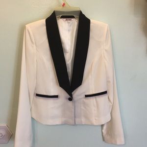 White and black blazer